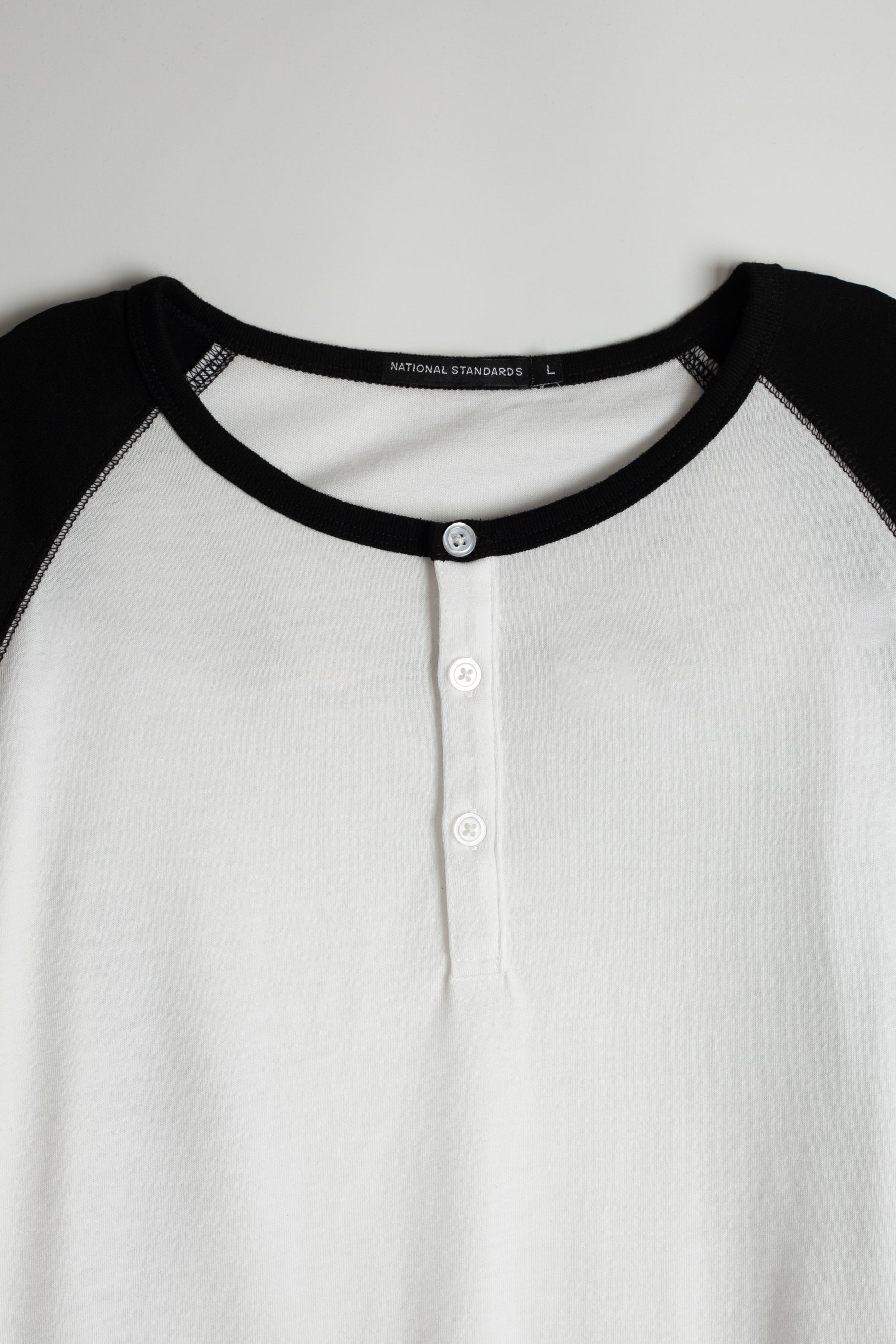 Tri-blend 3/4 henley in White and Black 06